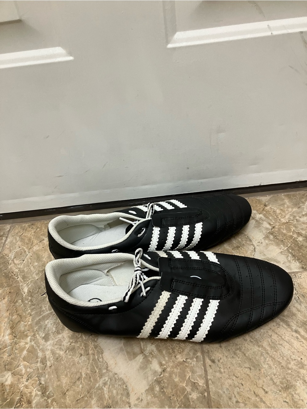Black and white Taekwondo shoes